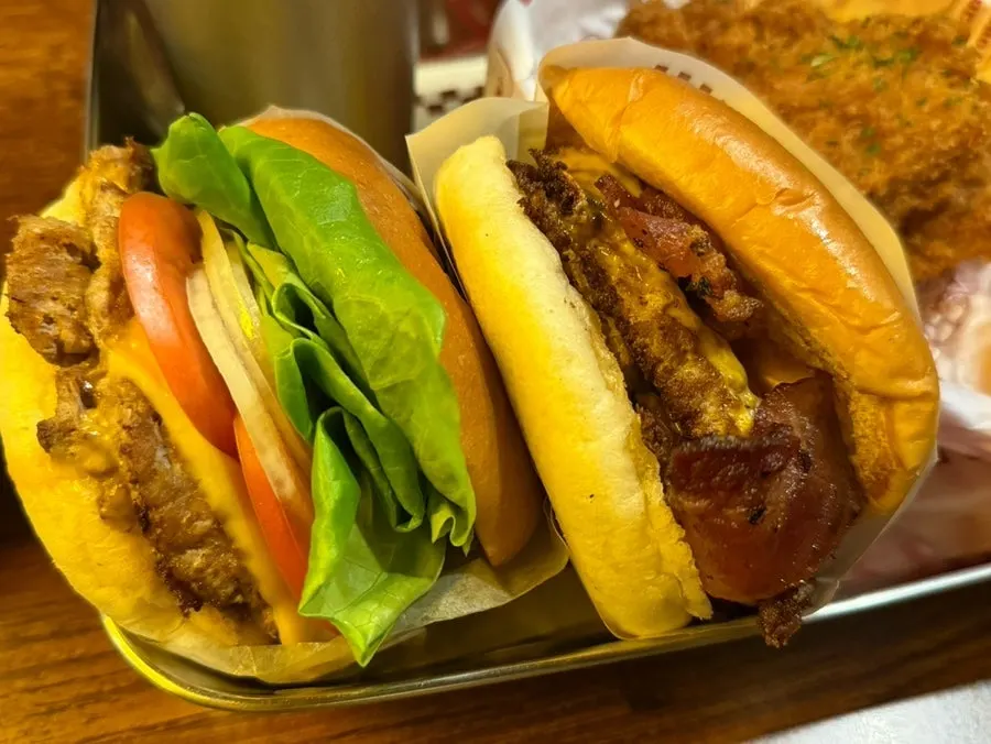 A full spread of Truffle Mayo Dip, burger, and potato chips