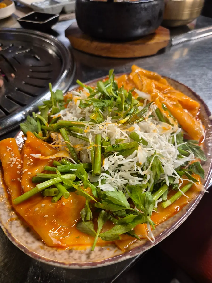 Flat spicy noodles with wide strands