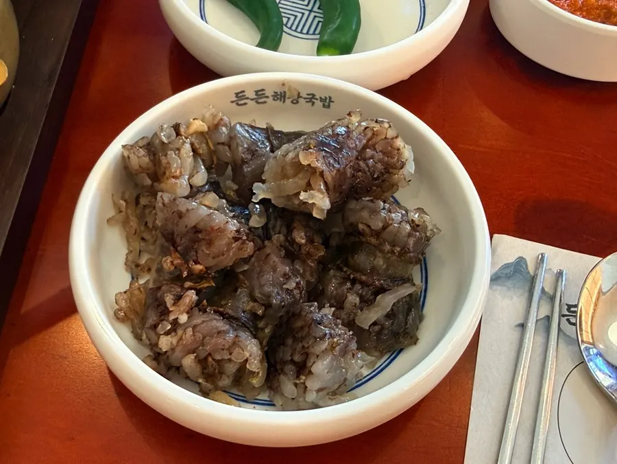 Meal with meat and dressed garlic chives