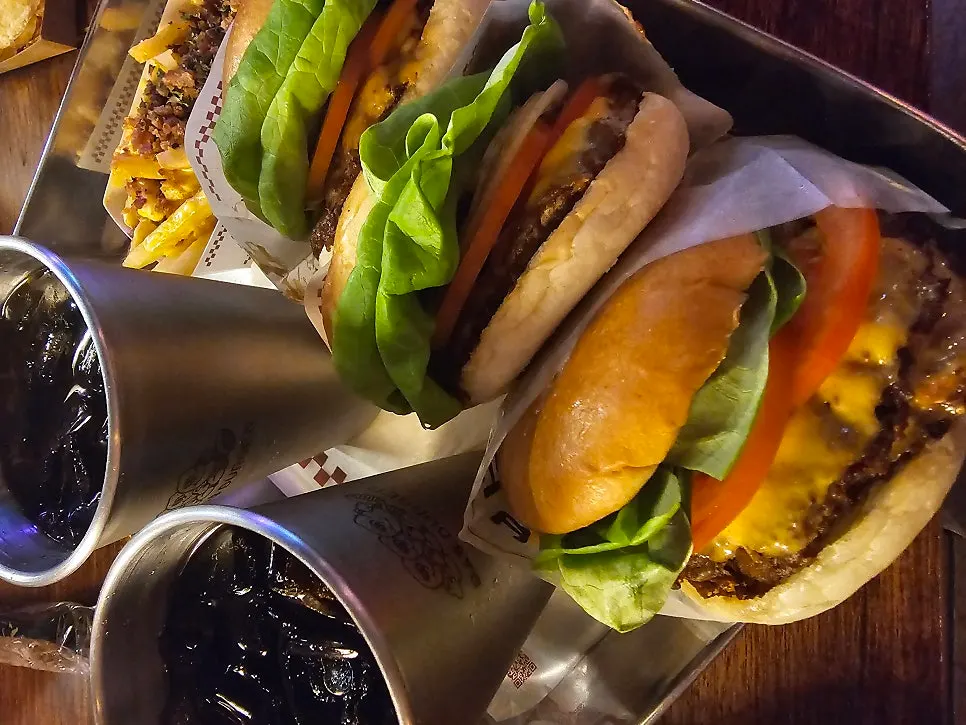 Burger sets and sides laid out on the table