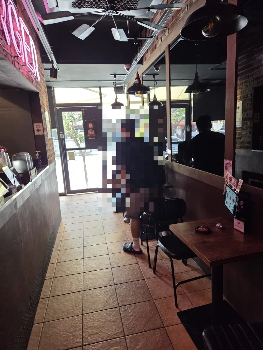 Pub-like interior with neon lighting