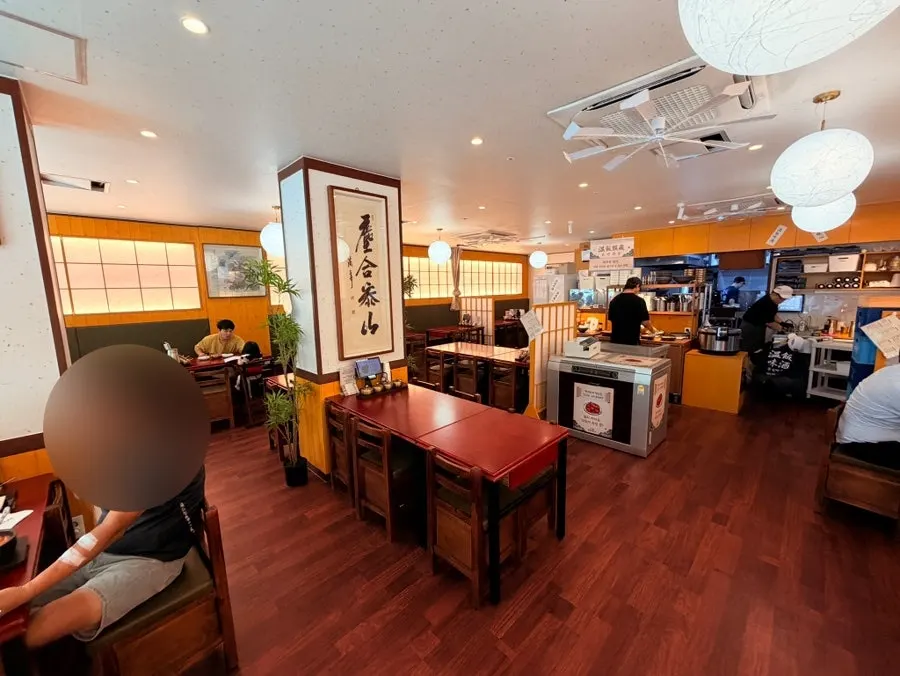 Neatly arranged interior seating at Deundeun Haejanggukbap