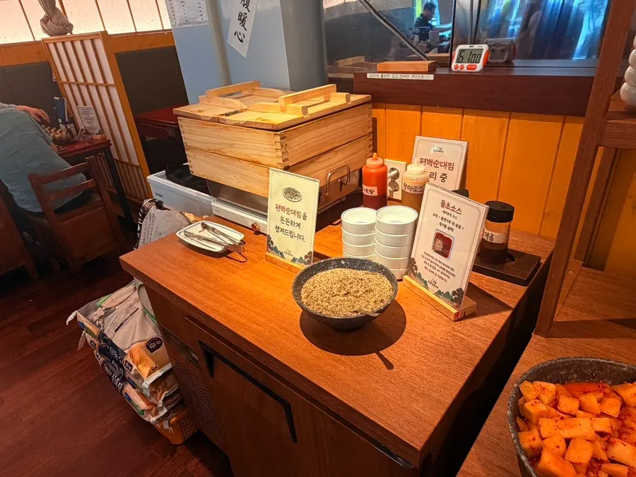 Self-serve bar where diners help themselves to side dishes