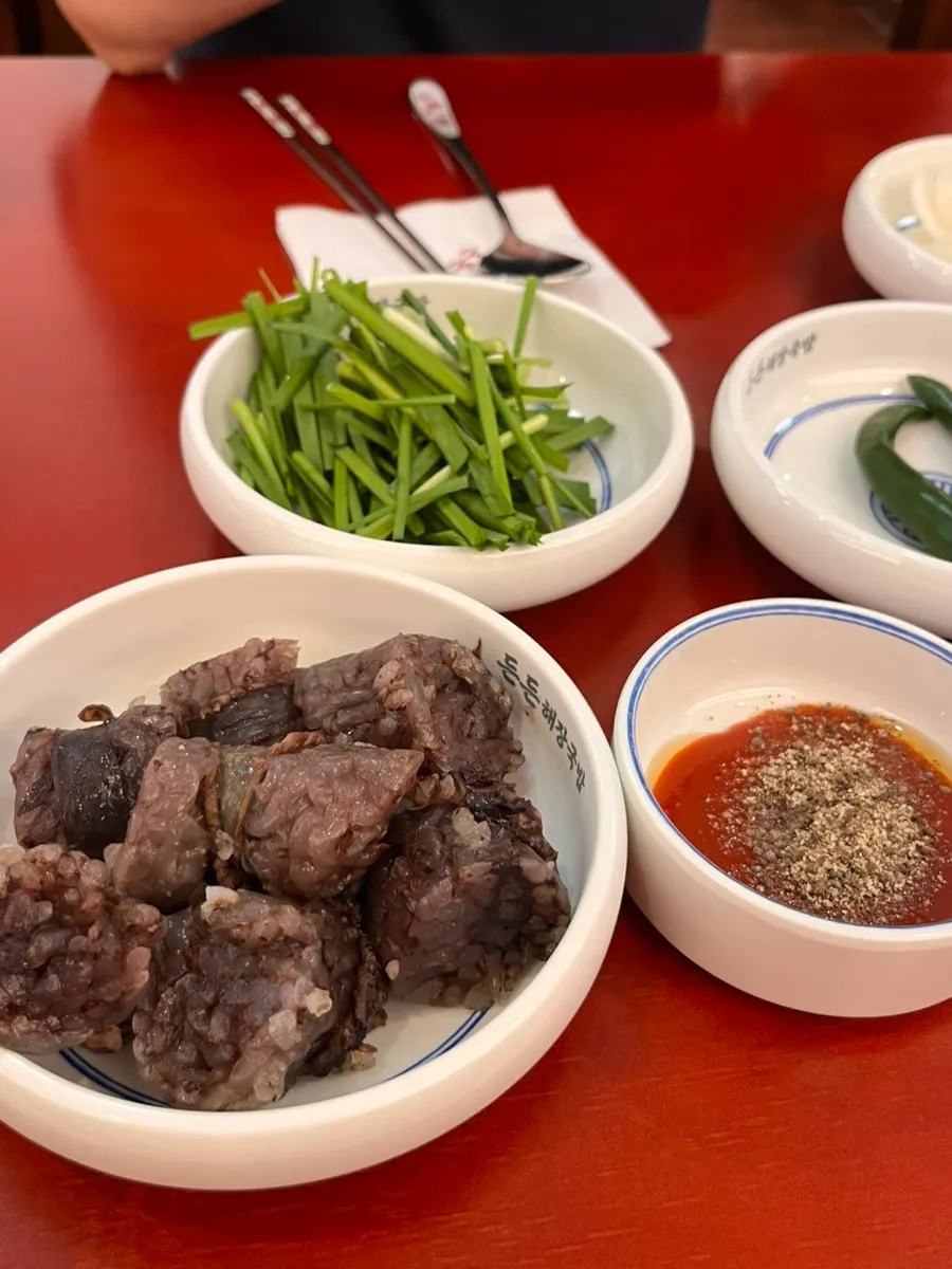 Full spread of side dishes served with the gukbap