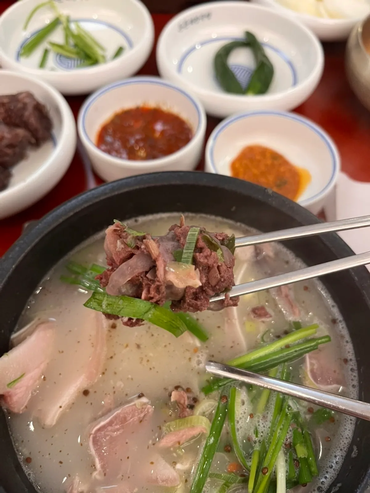 Blood sausage lifted out of the pork gukbap