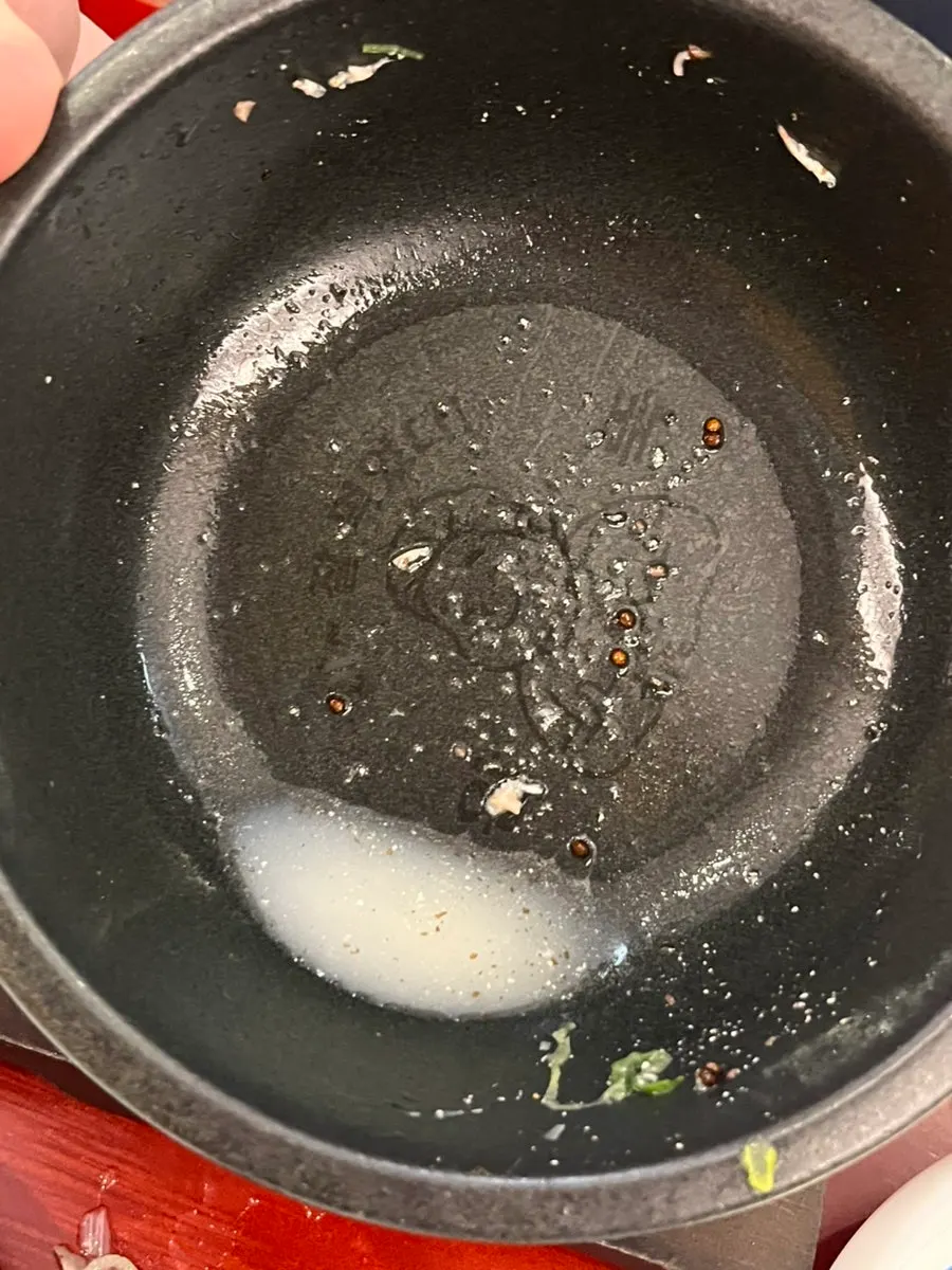 Bottom of the bowl showing the finish-the-bowl challenge text