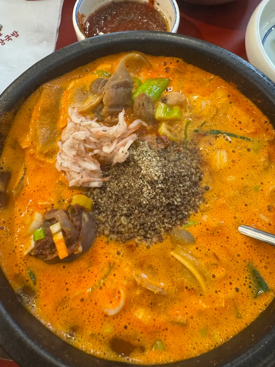 A full spread of spicy sundae gukbap at Deundeun Haejanggukbap Seonyudo Station Branch
