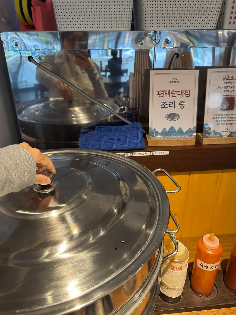 Kiosk screen showing gukbap and meal menu options