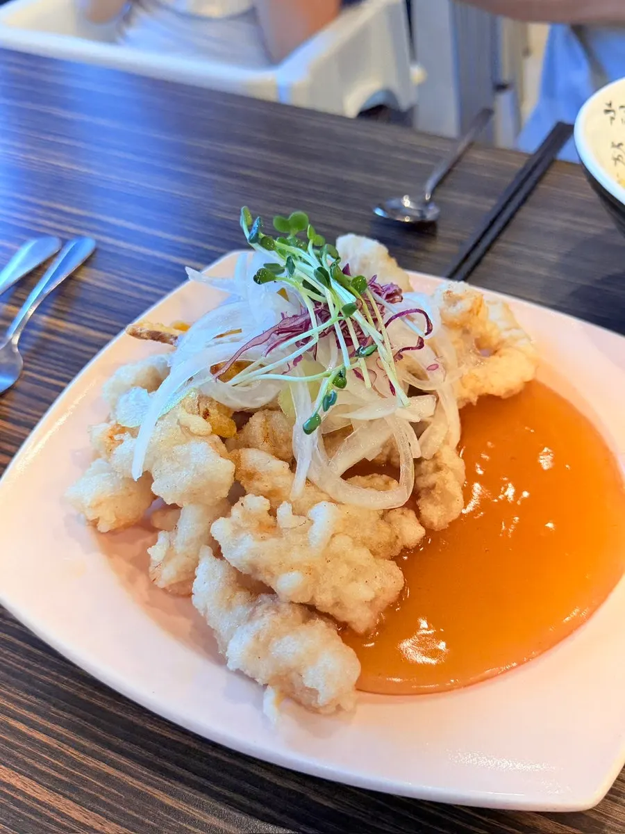 Sweet potato fritters served alongside the tangsuyuk