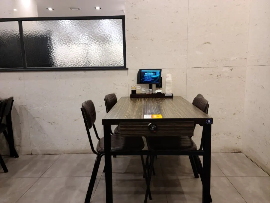 Brightly lit seating area of the restaurant