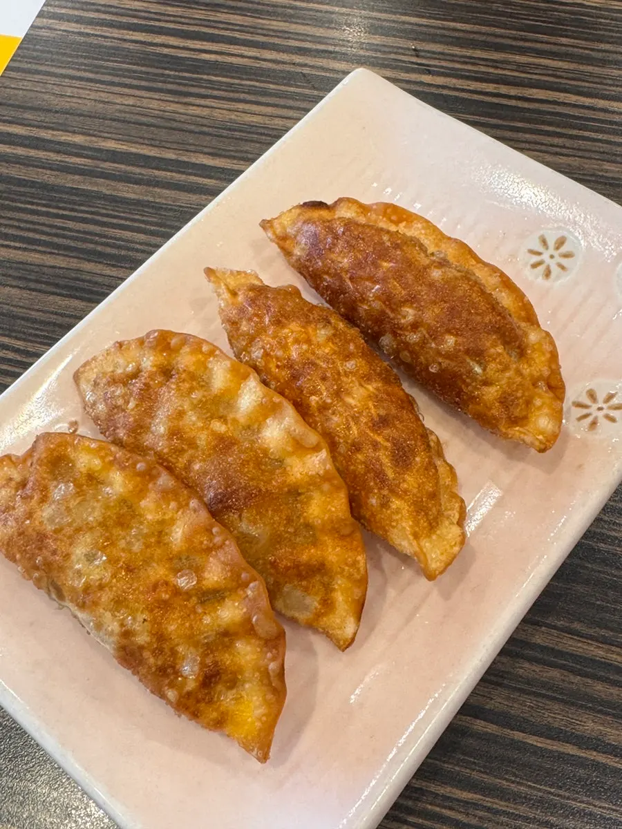 Cross-section of the sweet rice tangsuyuk showing thick pork pieces