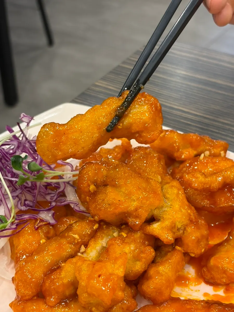 Close-up of the spicy sauce on Sichuan tangsuyuk