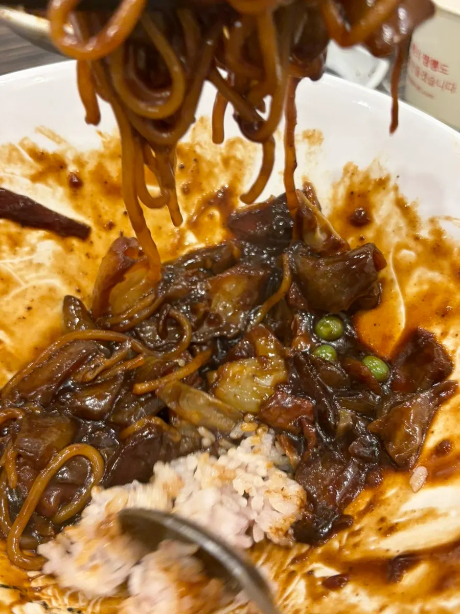 Rice served alongside jjamppong broth