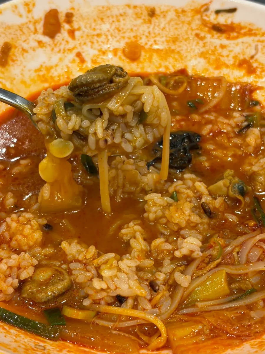 A bowl of rice mixed with jjajang sauce