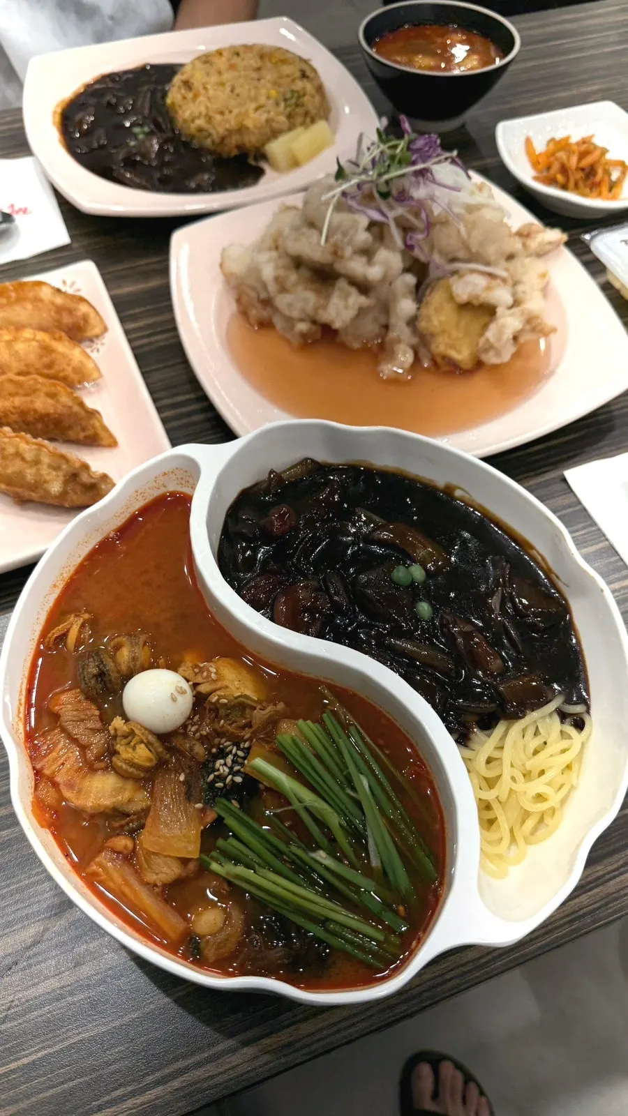Sweet rice tangsuyuk and large jjamjjamyeon on the table
