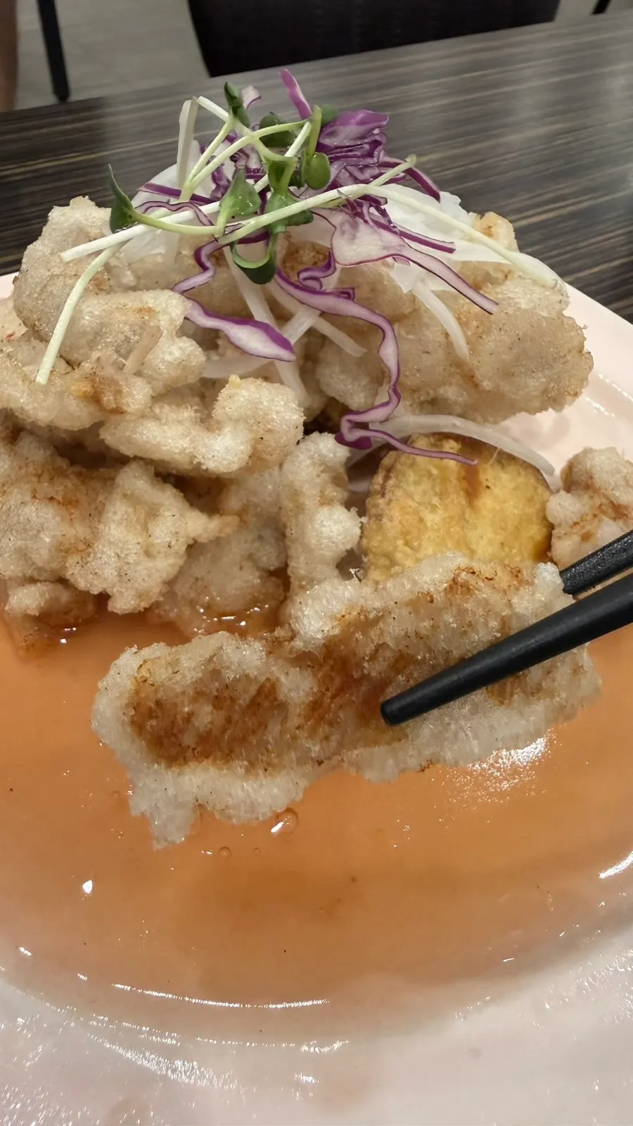 Sweet potato fritters served with the tangsuyuk