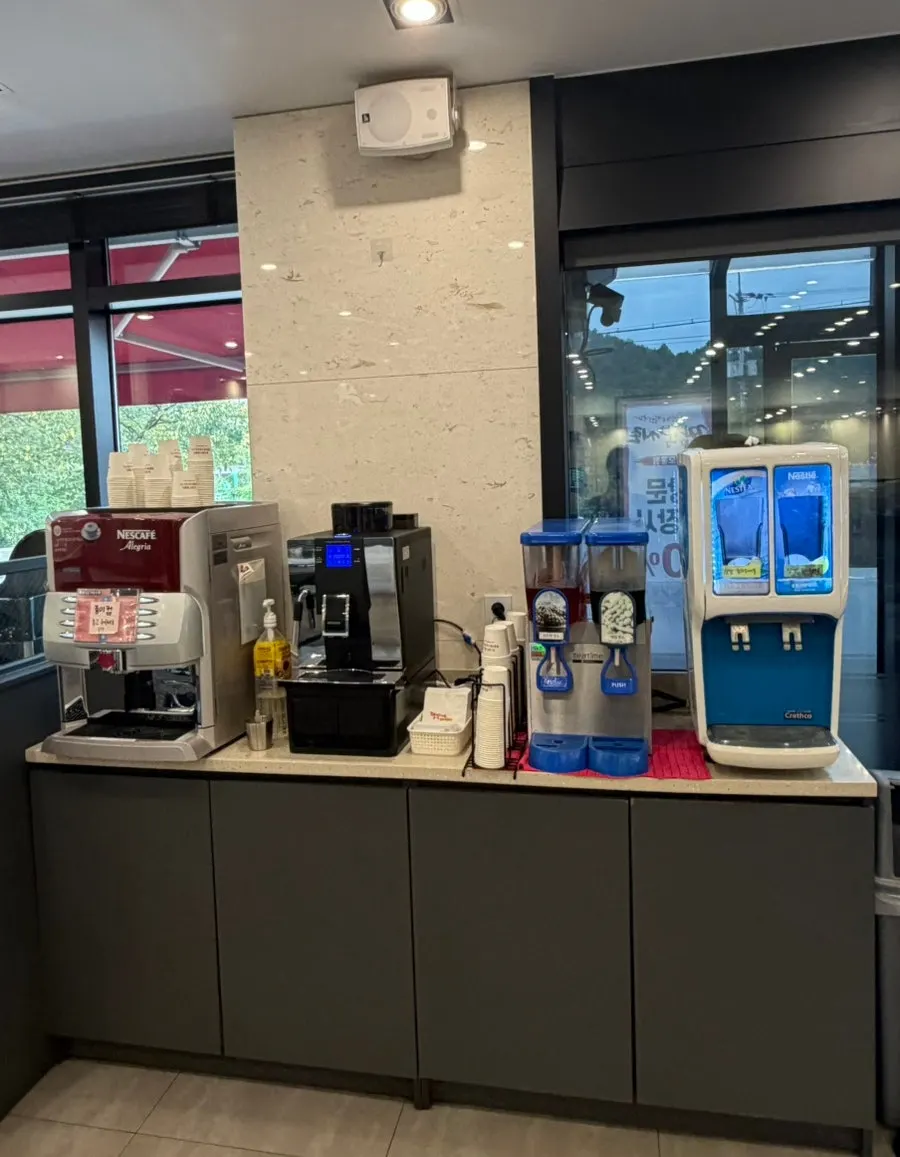 Free coffee and drink station behind the self-bar