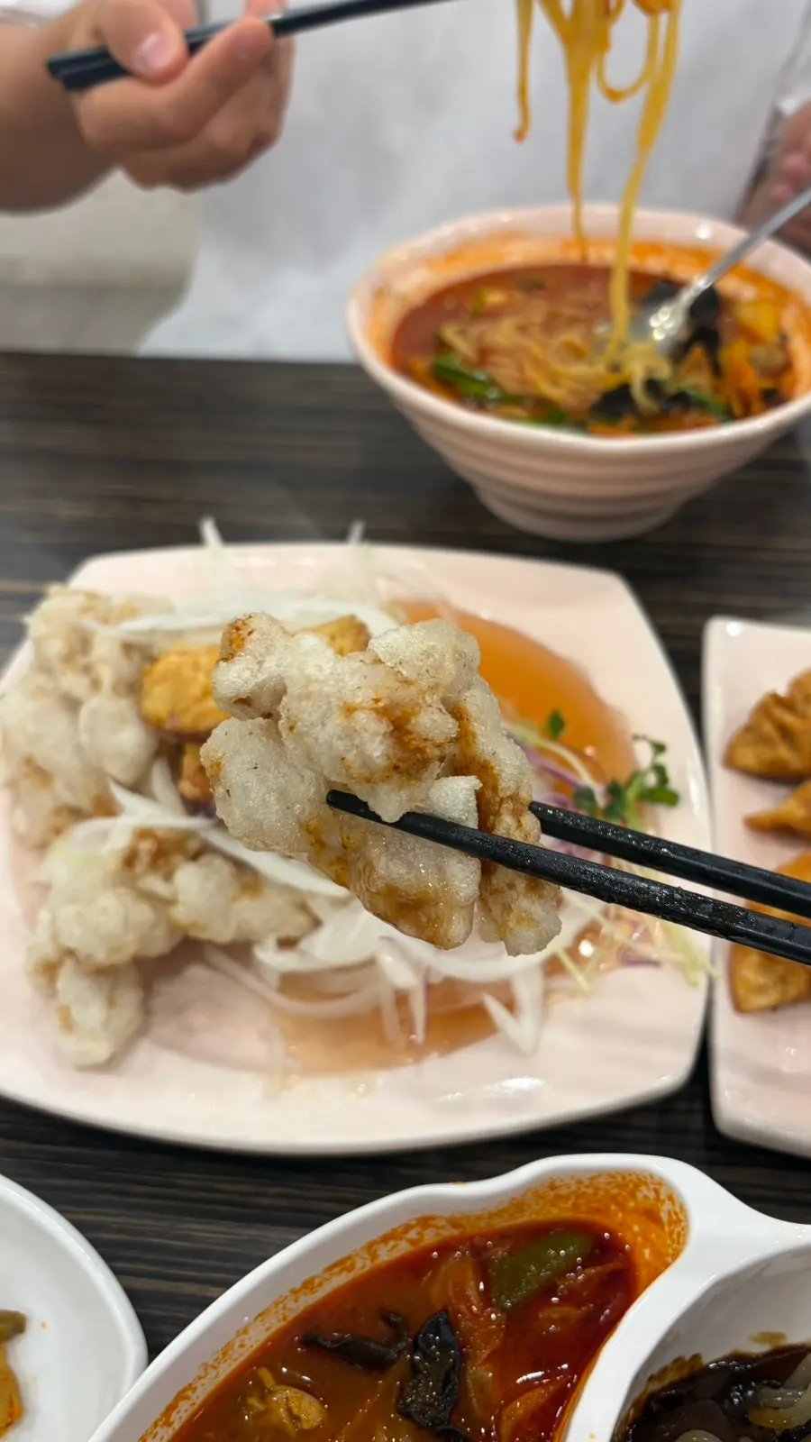 Pale golden batter on the crispy rice pork