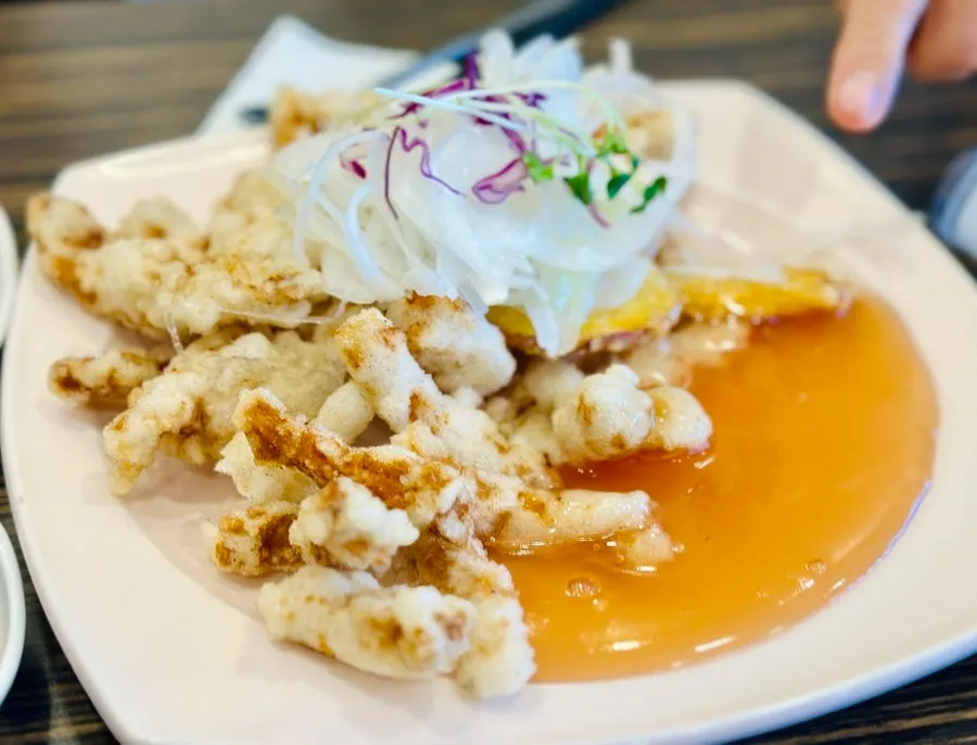 A plate of tangsuyuk with crispy batter