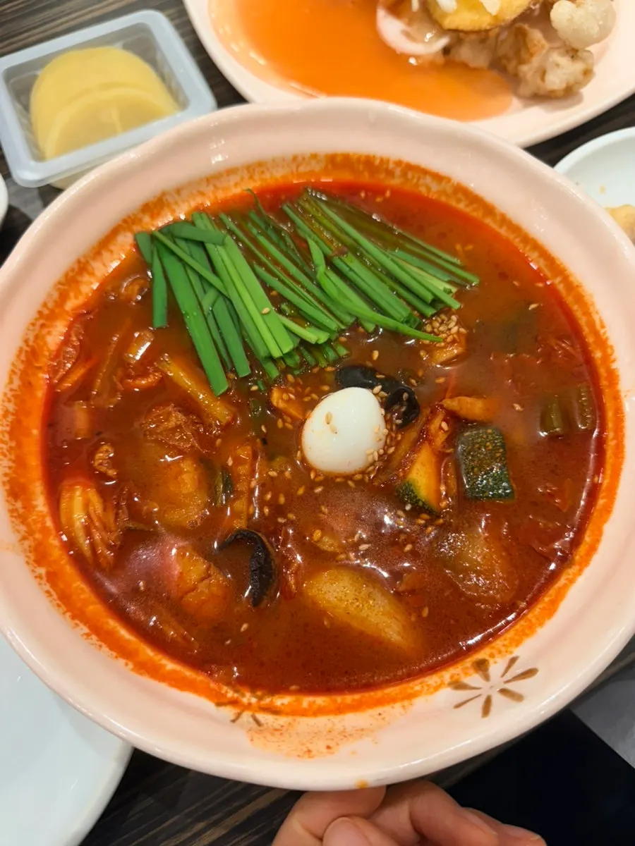 Table with glutinous rice tangsuyuk and jjamppong mandu