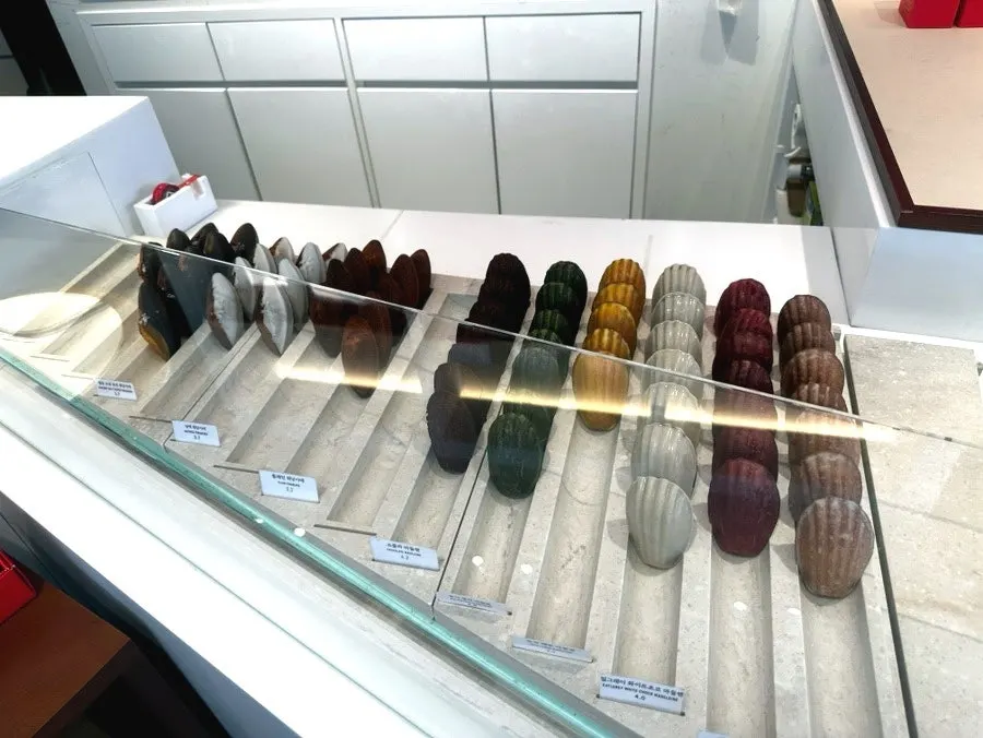 Display of madeleines, financiers, and other baked goods
