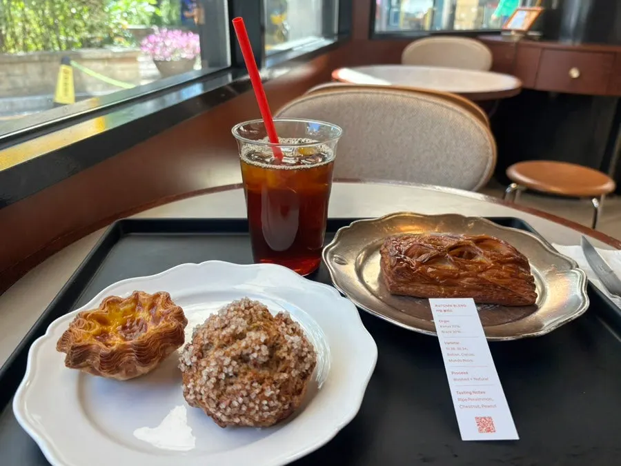 Remangdore bakery items and coffee of the day plated on the table