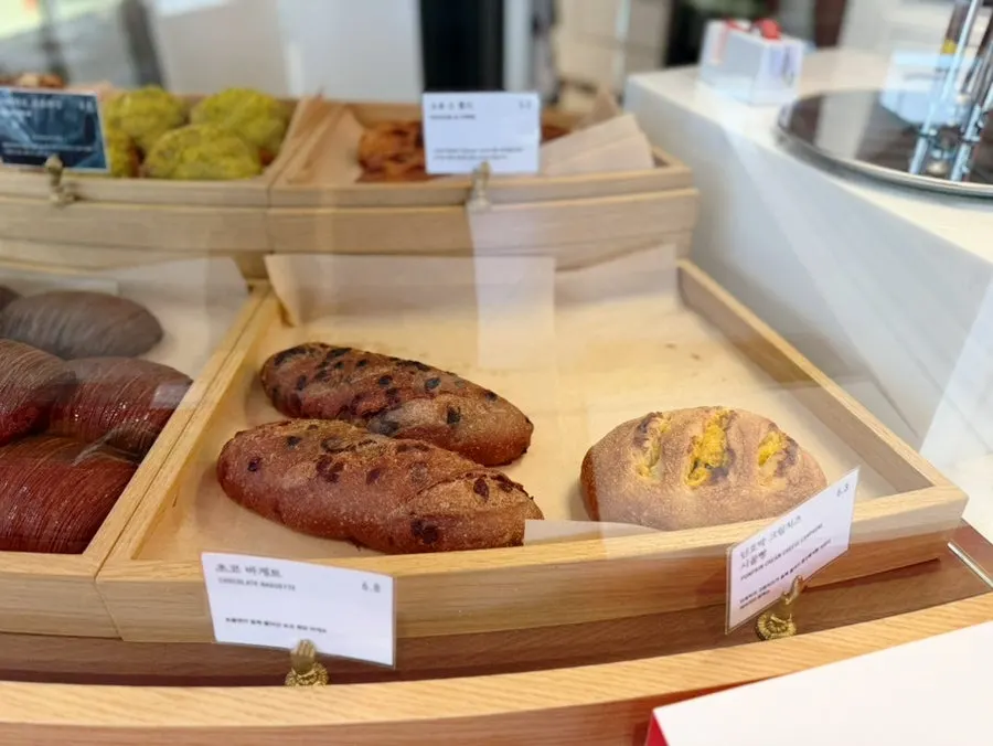 Display case with Remangdore's chocolate baguette