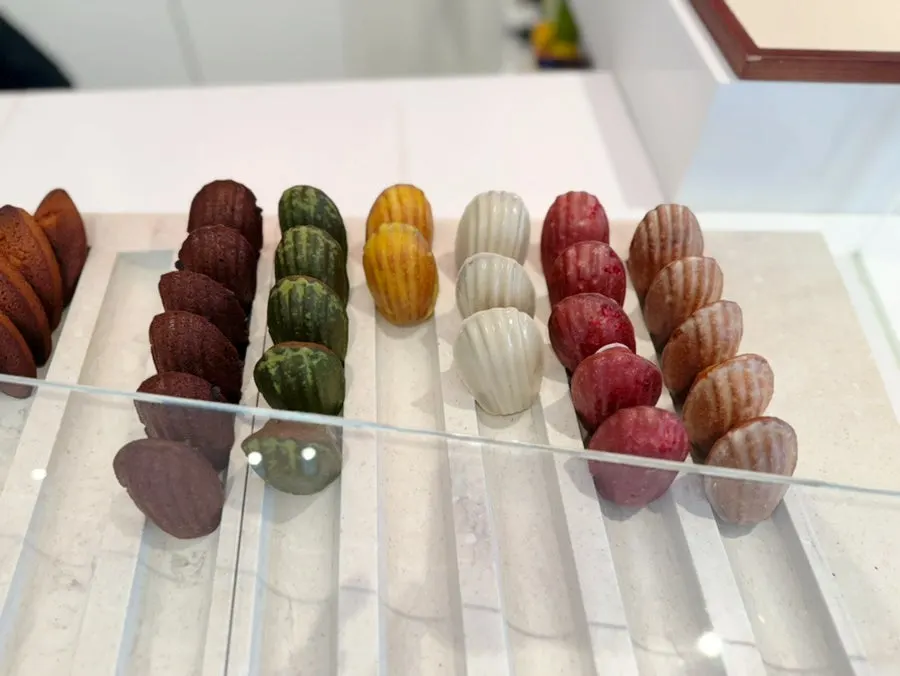 Display case with plain and yuzu lemon madeleines