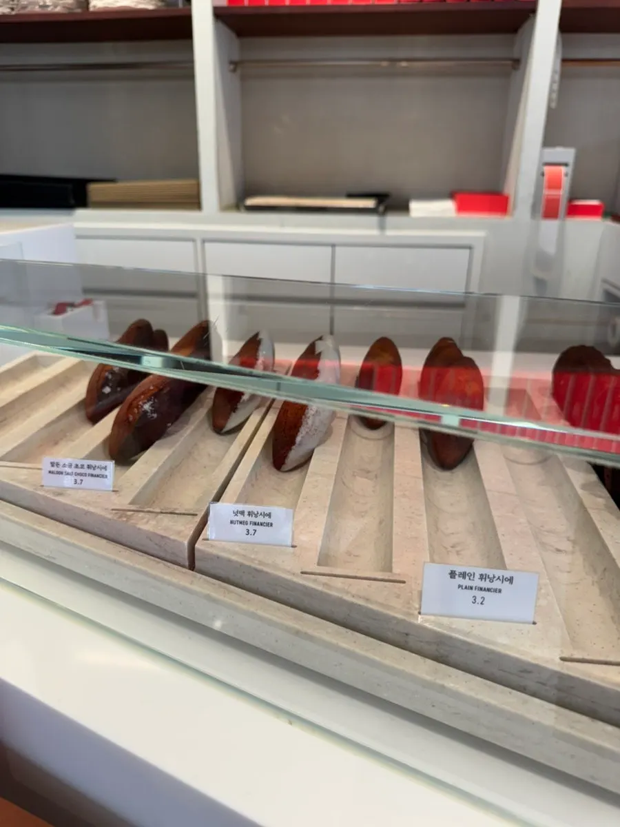 Baked goods displayed in the showcase at Remangdore Seorae Village Branch