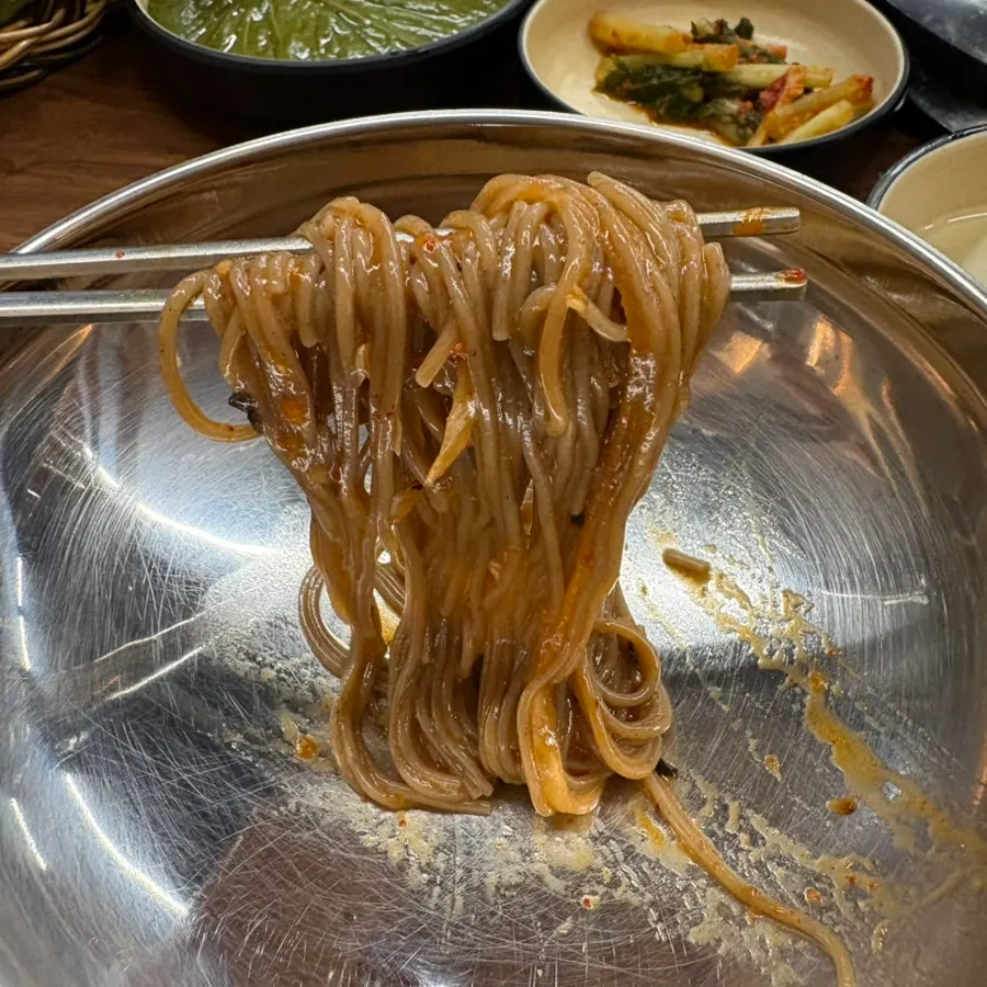 Glossy mixed bibim makguksu ready to eat