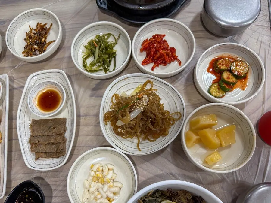 Plates of homemade banchan side dishes