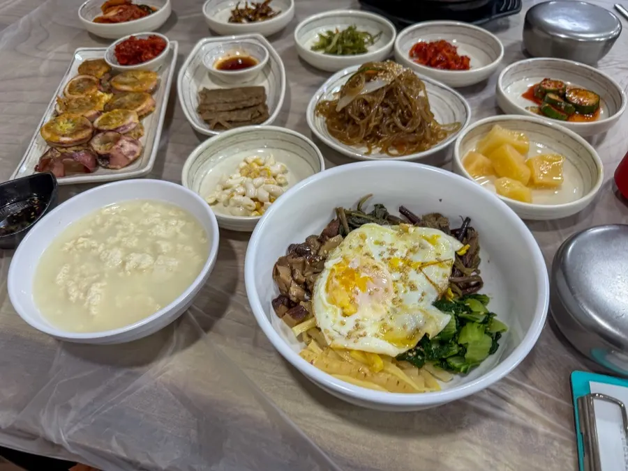 A spoonful of jjamppong seafood sundubu broth