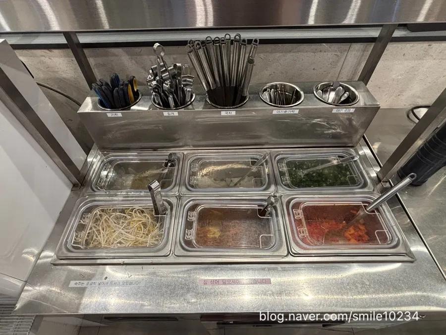 Self-service bar with side dishes and sharing plates
