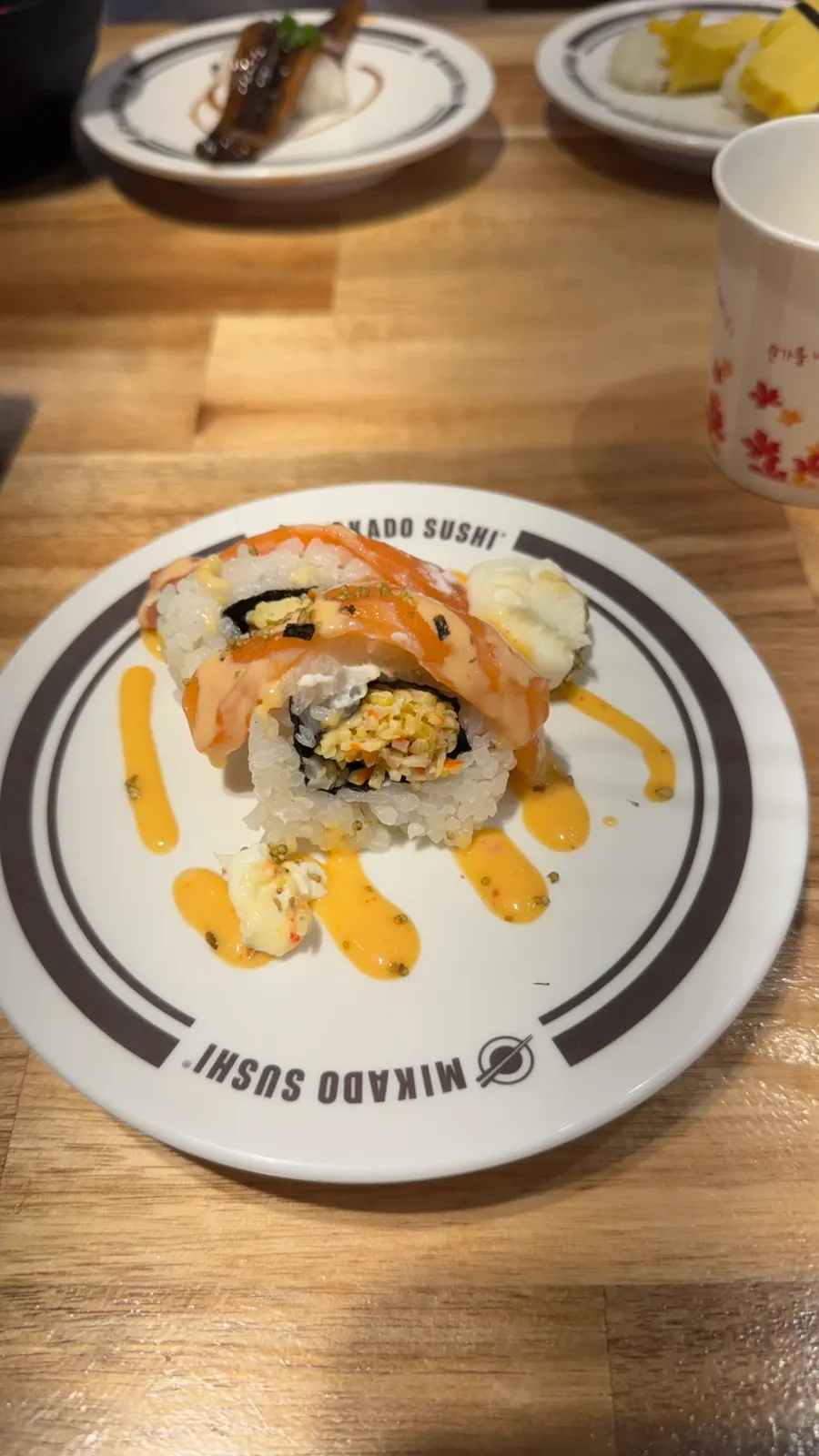 A plate of seared wagyu sushi