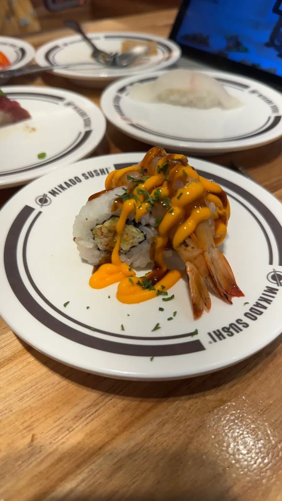 Sushi topped with a large chunk of eel
