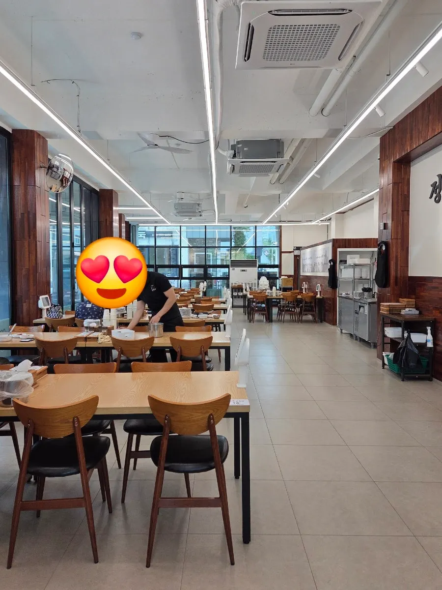 Restaurant hall with few customers at 2pm