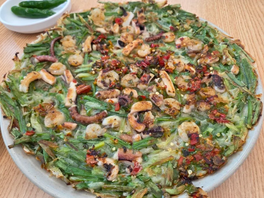 Oh-nak-sae seafood pancake topped with squid, octopus, and shrimp