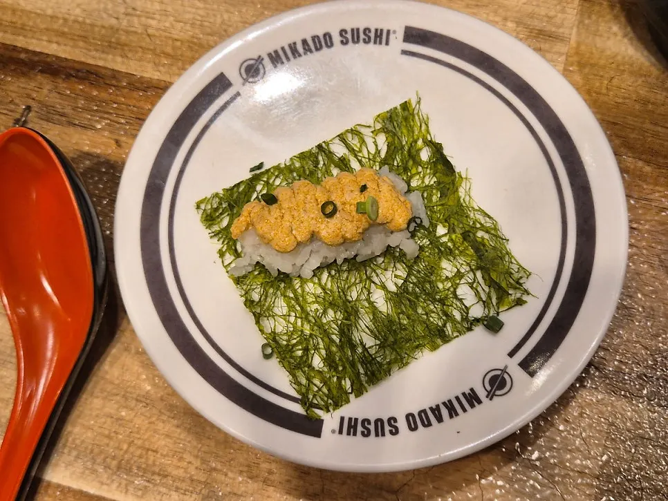Stacked sushi plates on the table