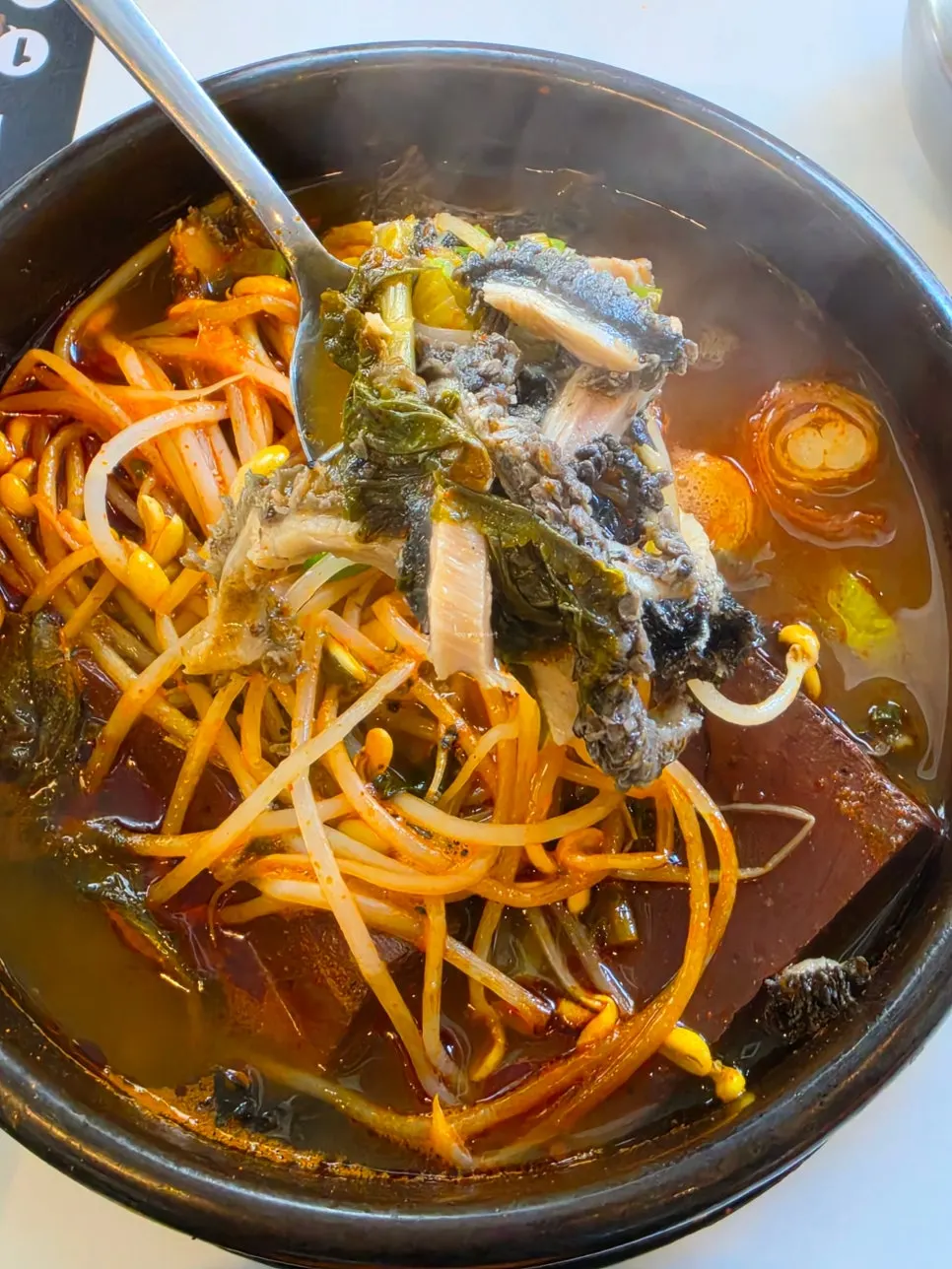 Ingredients in the soup, including cheonyeop and sundae