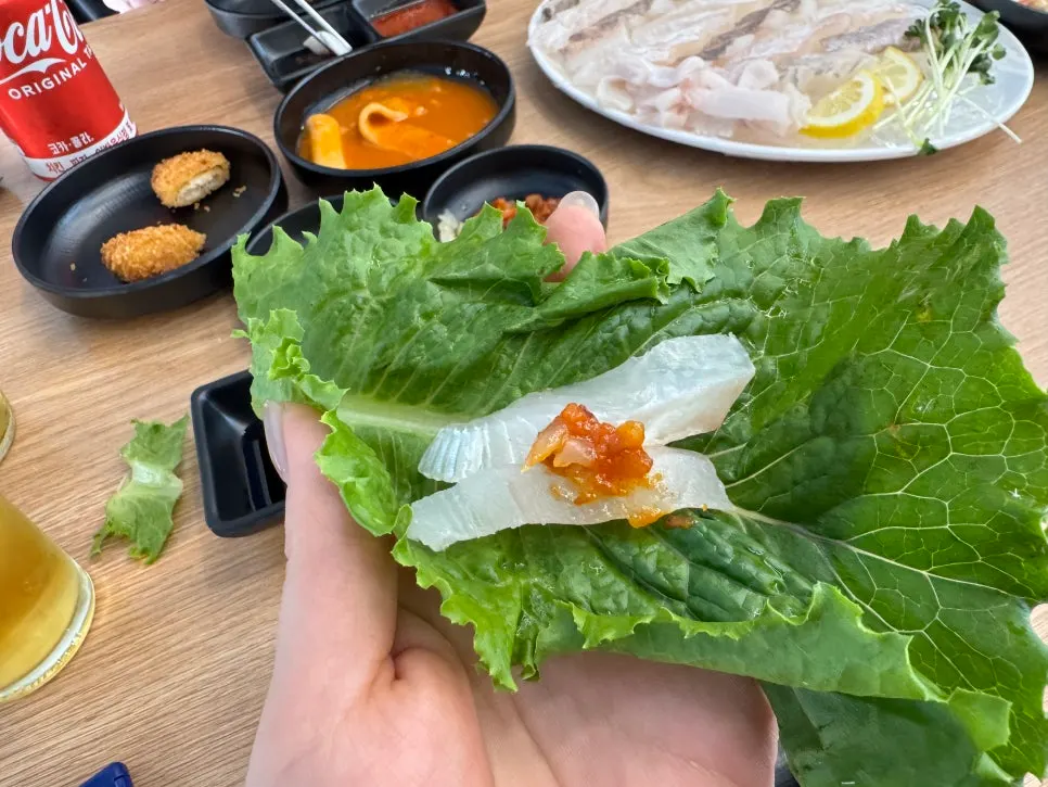 Thick slices of flounder and rockfish sashimi