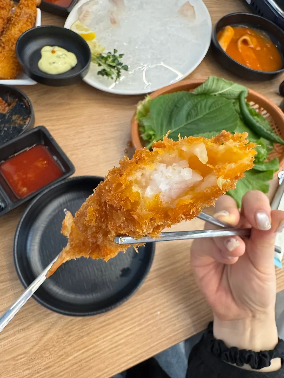 Fried king shrimp dipped in sauce