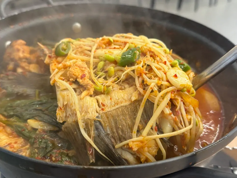 Fish bone spicy stew boiling on the burner