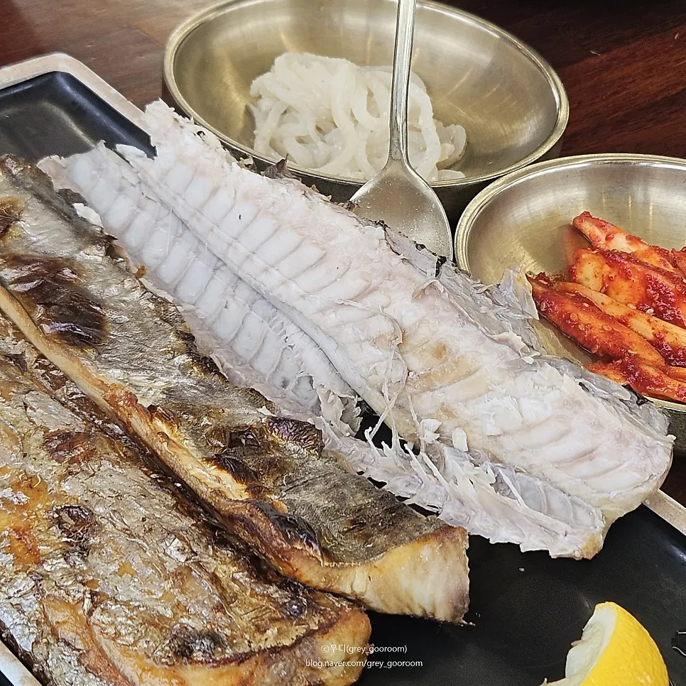 A plate of wood-fired grilled Spanish mackerel