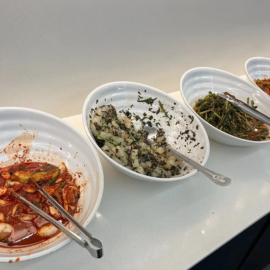 Neatly arranged banchan corner at the self-serve bar