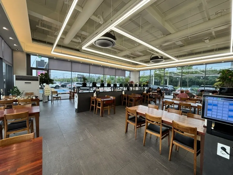 Spacious high-ceilinged interior of the restaurant