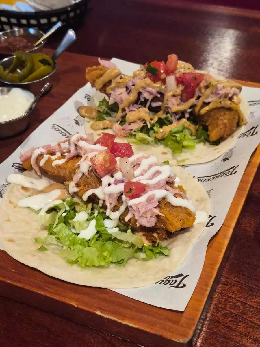 Chicken taco and fish taco at Taqueros
