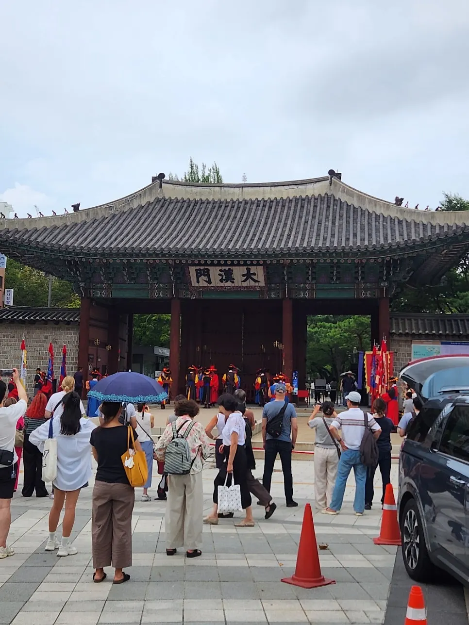 A procession of guards in traditional dress during the ceremony