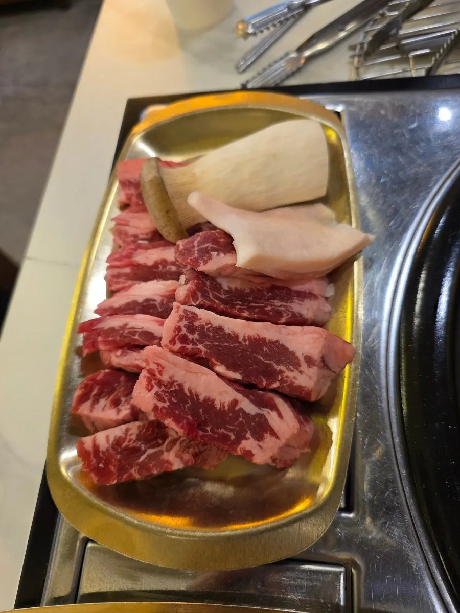 Plated raw galbisal and galbi bon-samgyeop