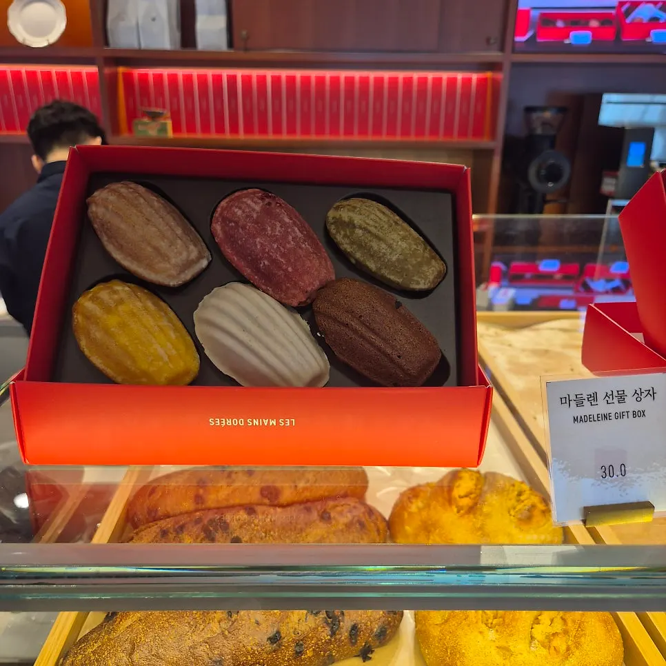 Egg tart and chausson aux pommes counter