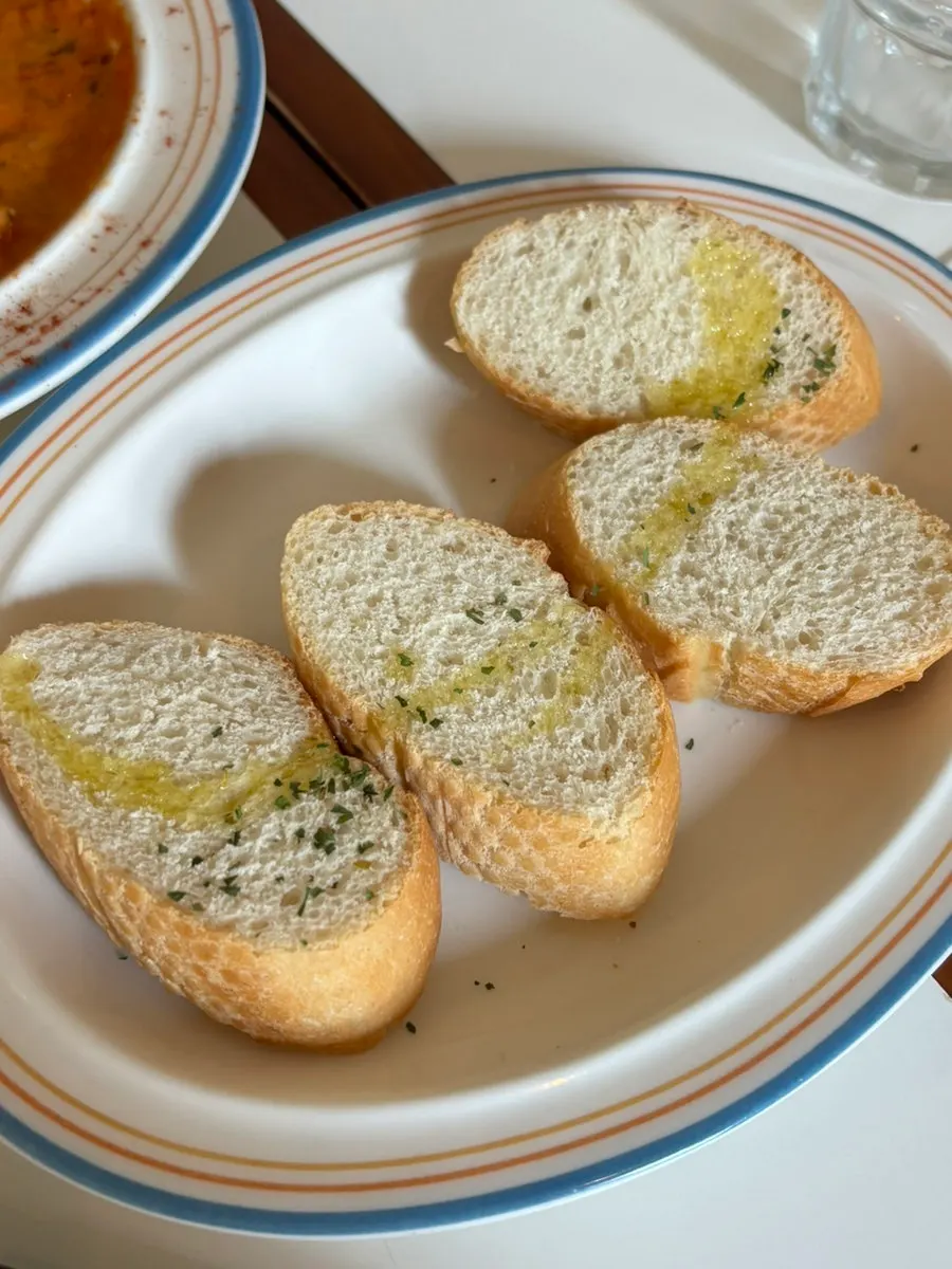 Extra bread dipped in rosé sauce